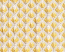 Yellow and white geometric-patterned fabric texture, ideal for home decor. Maison Mermont.