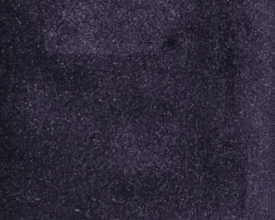 Luxurious dark velvet fabric texture, perfect for chic home decor accents. Maison Mermont.