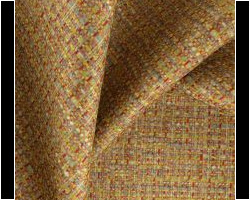 Textured fabric with a multicolored woven pattern for home furnishings. Maison Mermont.