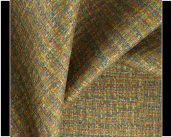 Textured multicolor woven fabric for home furnishing, showcasing intricate patterns. Maison Mermont.