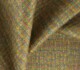 Textured multicolor woven fabric for home furnishing, showcasing intricate patterns. Maison Mermont.