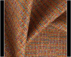Colorful woven upholstery fabric with intricate pattern, perfect for home decor elegance. Maison Mermont.