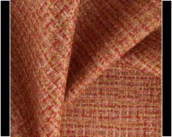 Textured red and orange fabric with a woven pattern, ideal for upholstery. Maison Mermont.