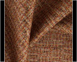 Textured multicolor woven fabric for home decor, warm earthy tones. Maison Mermont.
