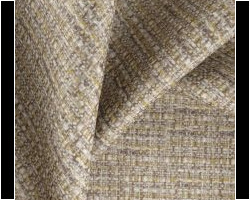 Luxurious beige and gold textured fabric for home furnishing. Maison Mermont.