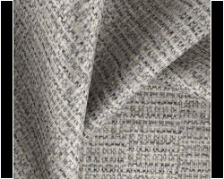 Grey textured woven fabric with a subtle check pattern, ideal for upholstery and home decor. Maison Mermont.