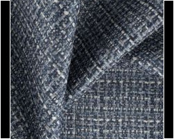 Textured blue and white tweed fabric for upholstery or home decor. Maison Mermont.