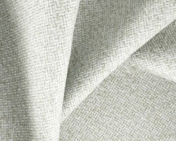 Woven texture light grey home furnishing fabric close-up. Maison Mermont.