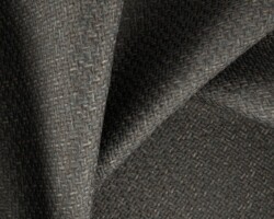 Dark textured fabric with a woven pattern, ideal for home decor. Maison Mermont.