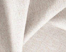 Beige woven fabric with a textured pattern for home furnishings. Maison Mermont.