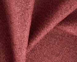Rich textured burgundy fabric with intricate weave detail for home decor. Maison Mermont.