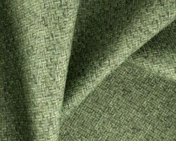 Green woven upholstery fabric with a textured pattern, ideal for home furnishings. Maison Mermont.