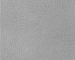 Soft grey leather texture of a home furnishing product. Maison Mermont.