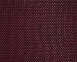 Deep burgundy woven fabric texture for upholstery, enhancing home decor elegance. Maison Mermont.