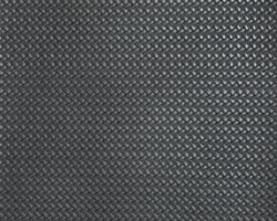 Dark woven texture close-up, ideal for modern home decor or furniture accent. Maison Mermont.