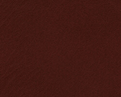 Rich brown textured leather upholstery for home furnishing. Maison Mermont.