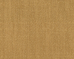 Golden textured fabric sample for home decor, showcasing woven details. Maison Mermont.