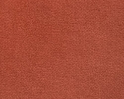 Rust-colored textured fabric, ideal for home decor upholstery. Maison Mermont.