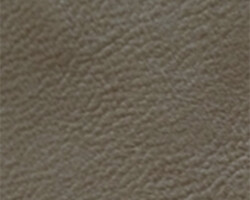 Brown textured leather fabric for sofas or chairs. Maison Mermont.