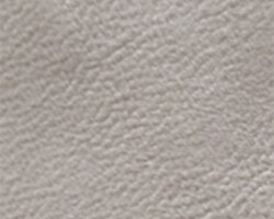 Close-up of beige leather texture for home furnishings. Maison Mermont.