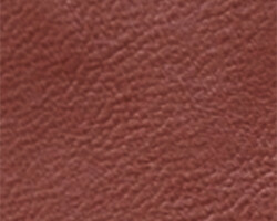 Rich brown leather texture for luxury home decor finishes. Maison Mermont.