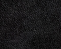 Black textured woven fabric, suitable for upholstery. Maison Mermont.