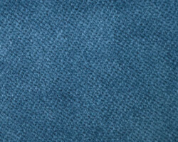 Blue textured fabric, ideal for upholstery and home decor accents. Maison Mermont.