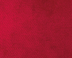 Deep red textured carpet fabric, ideal for home decor. Maison Mermont.