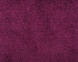Rich plum woven fabric texture, ideal for upholstery or decor accents. Maison Mermont.
