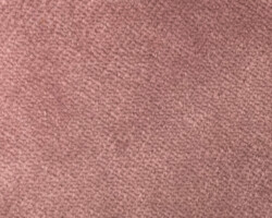Soft pink textured fabric surface, ideal for cozy home furnishing. Maison Mermont.