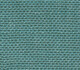 Twill FR Close-up of teal woven fabric texture, ideal for upholstery. Maison Mermont.