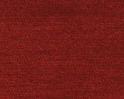 Rich red textured carpet material, ideal for cozy home decor. Maison Mermont.