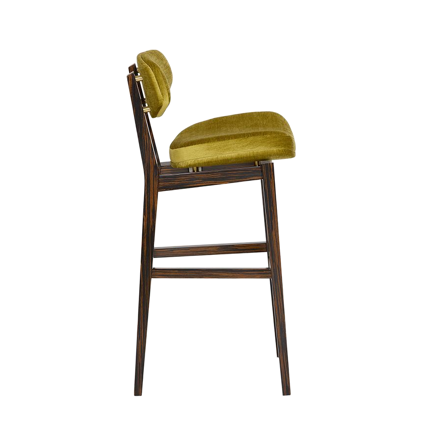 Stylish bar stool with a velvet olive green cushion and dark wood frame, perfect for modern interiors. Maison Mermont.