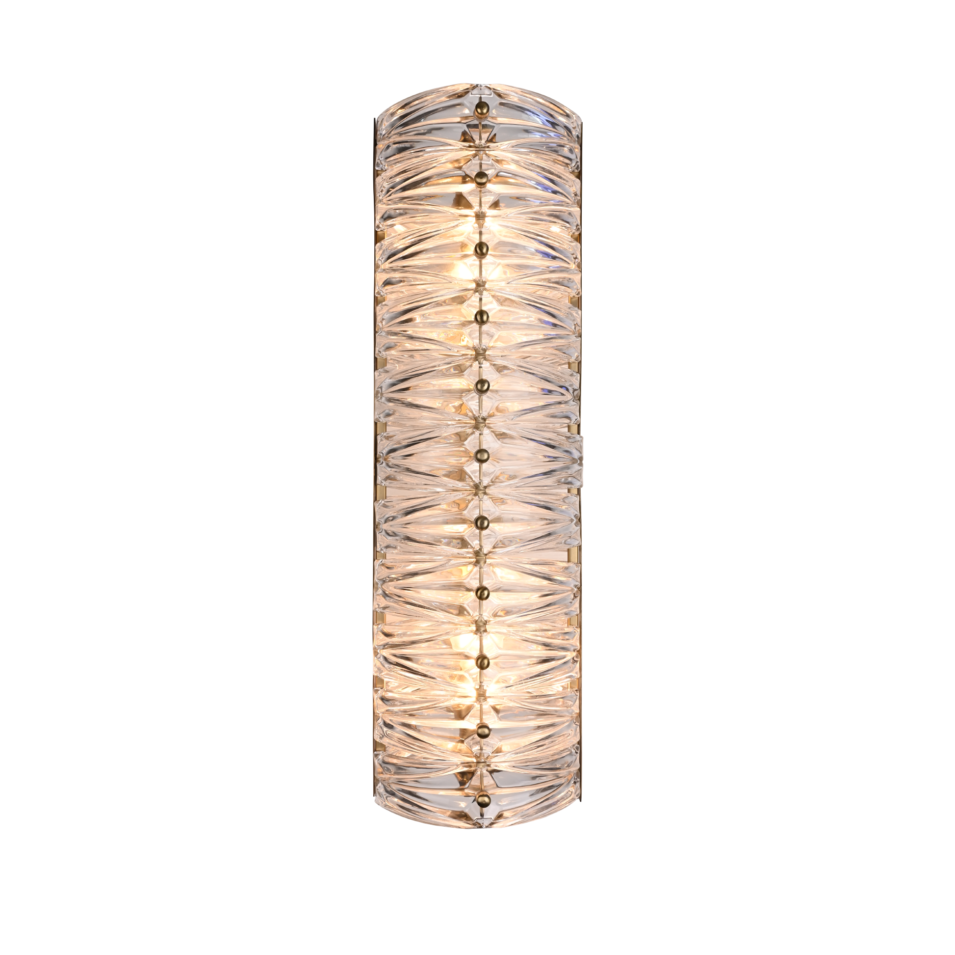 Elegant cylindrical glass wall sconce with brass accents, providing a warm glow. Perfect for modern decor. Maison Mermont.