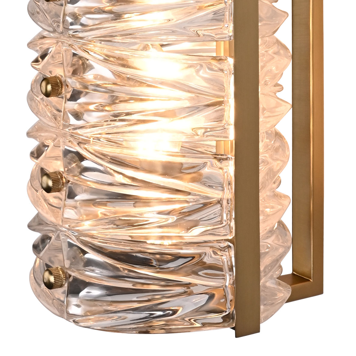 Stylish glass wall light with elegant twisted design and brass accents, ideal for modern interiors. Maison Mermont.