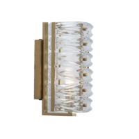 Elegant wall sconce with crystal accents and gold frame, perfect for enhancing interior decor. Maison Mermont.