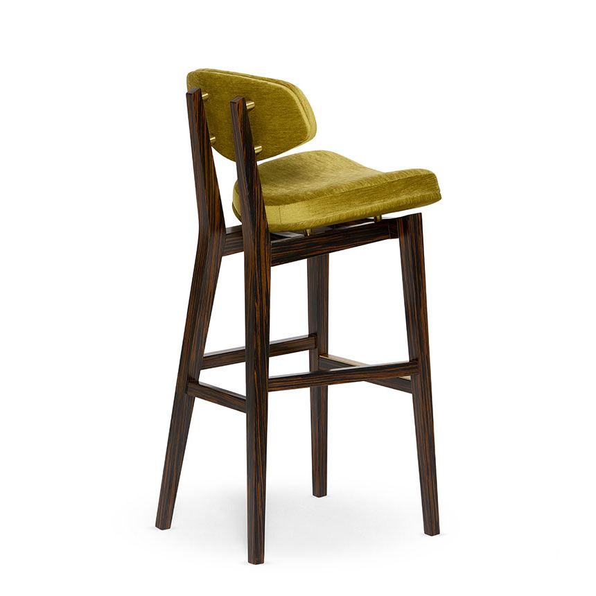 Coleman Bar Stool Olive green velvet bar stool with dark wooden legs, elegant modern design. Maison Mermont.
