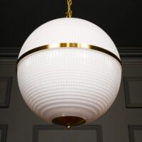 Large Opaline Parisian Globe Pendant_7268-1560x1560 Elegant white globe pendant light with gold accents, perfect for modern interiors. Maison Mermont.