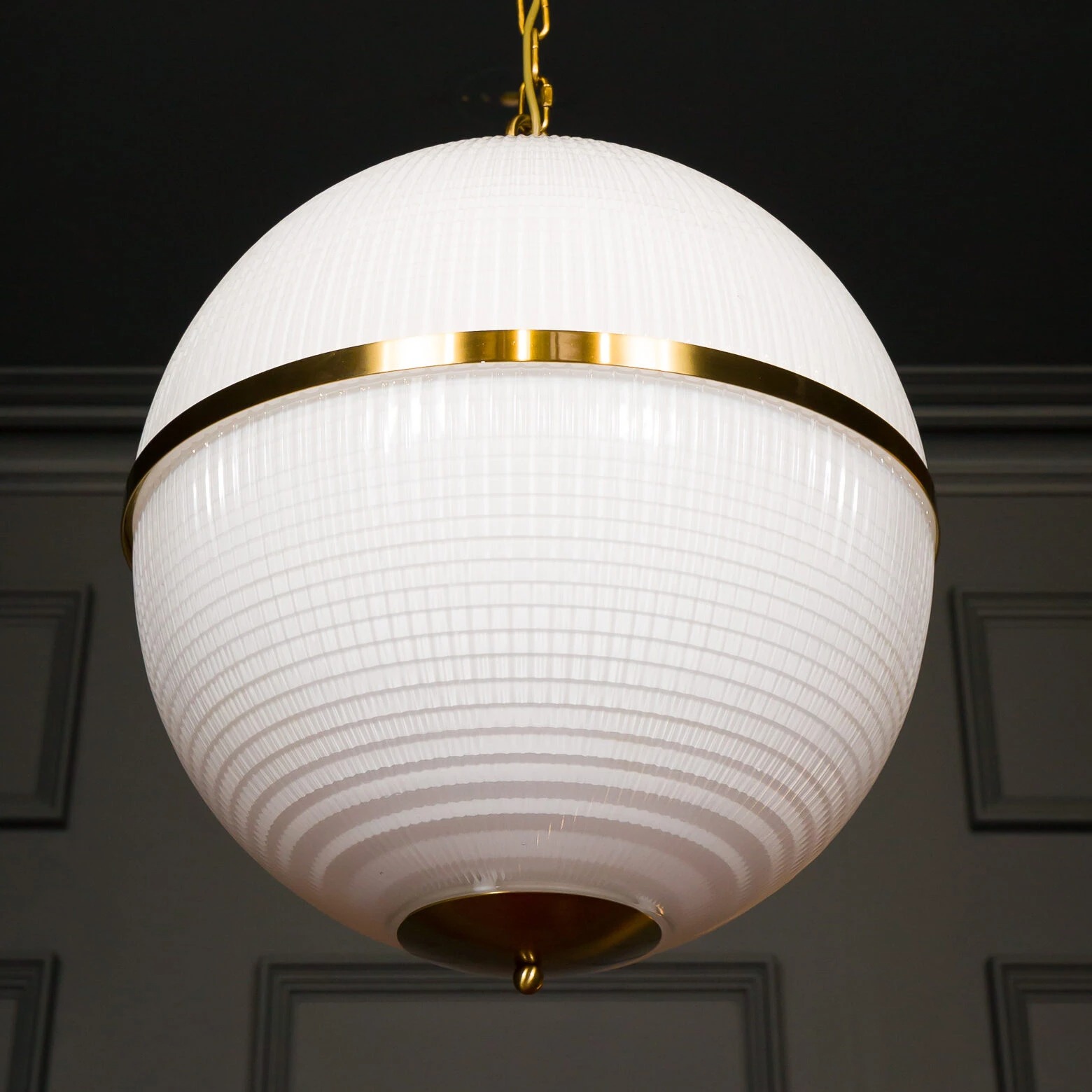 Large Opaline Parisian Globe Pendant_7268-1560x1560 Elegant white globe pendant light with gold accents, perfect for modern interiors. Maison Mermont.