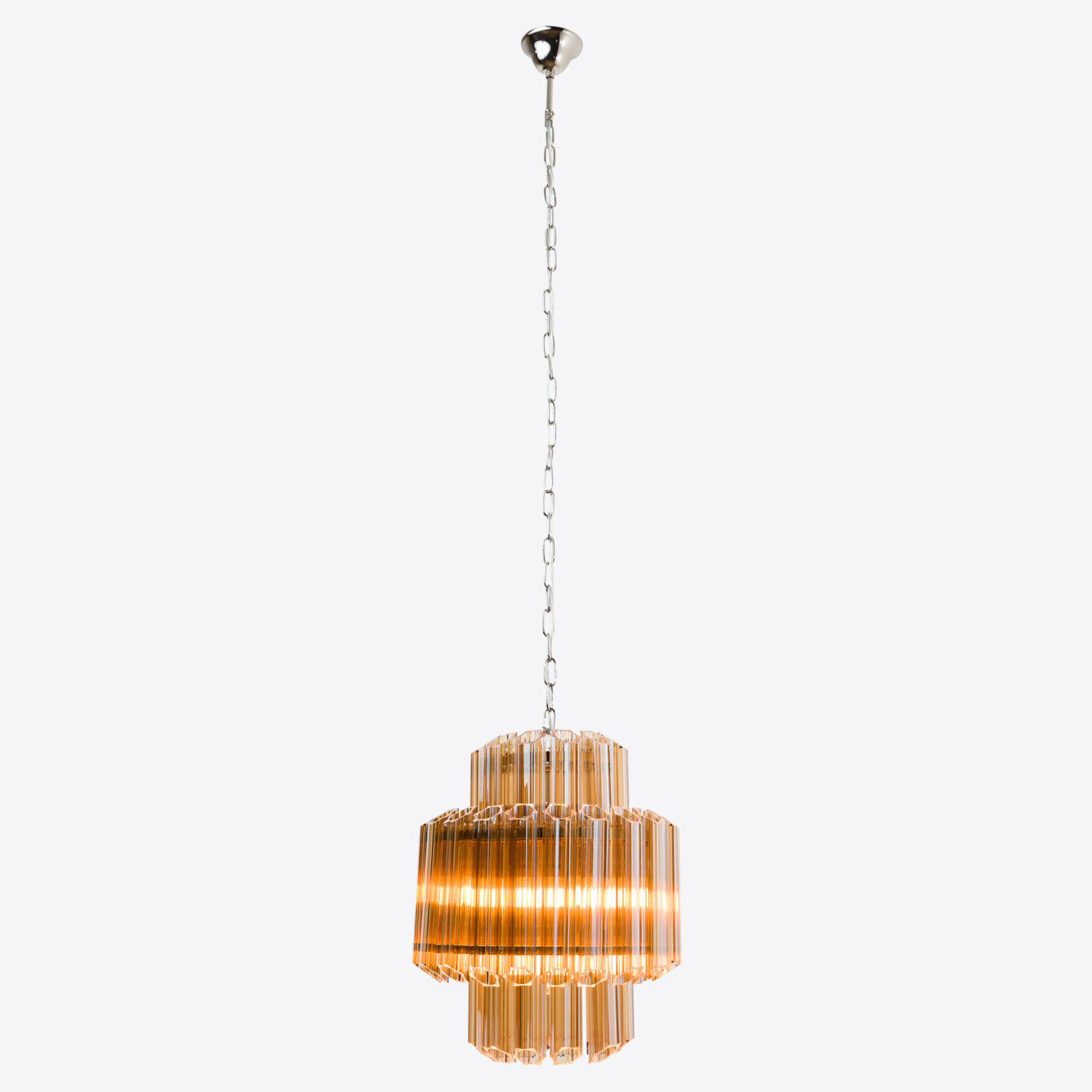Amber-Small-Celesta-Chandelier Vintage-style amber glass pendant light with tiered design. Ideal for elegant interiors. Maison Mermont.