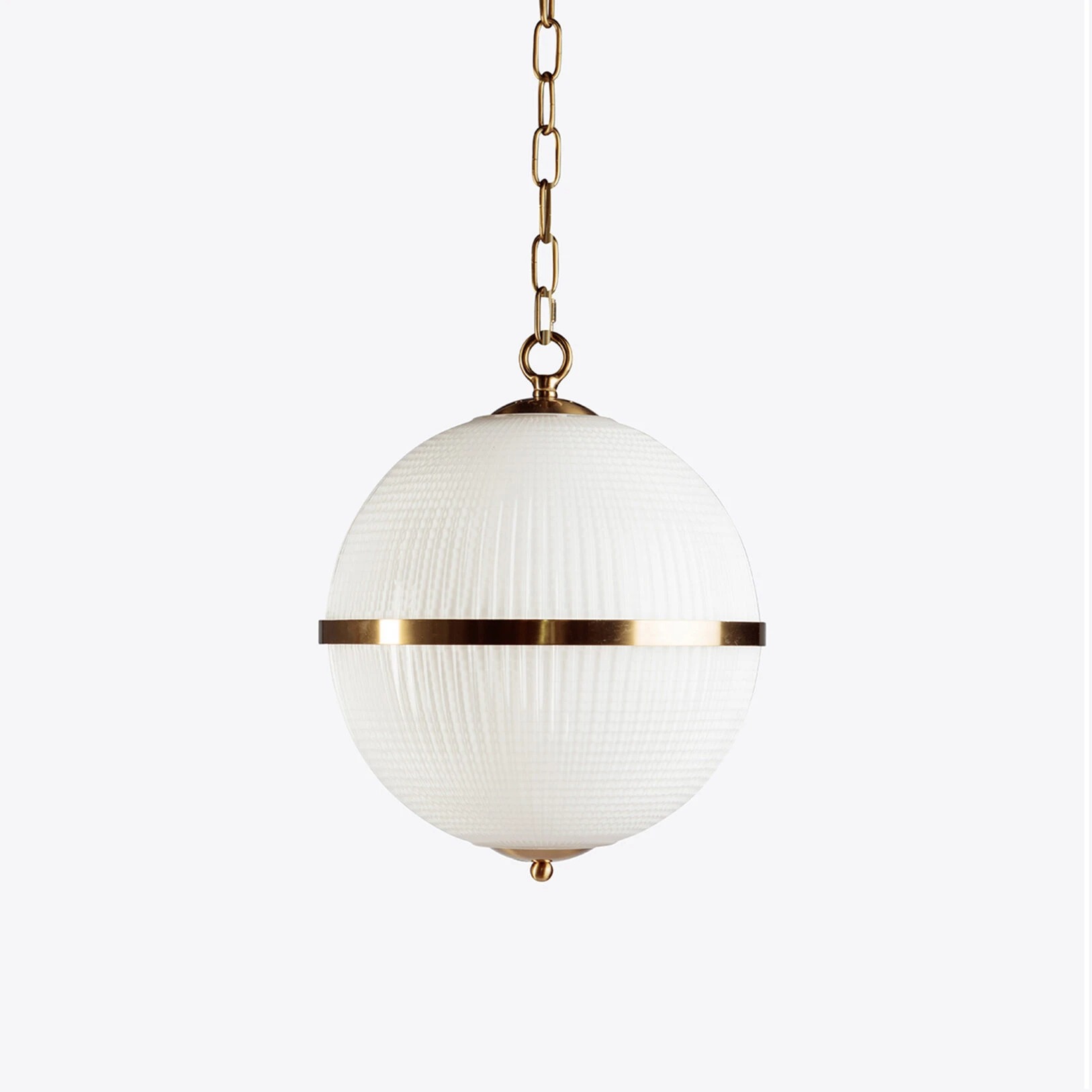 Elegant white globe pendant light with gold accents, perfect for modern or classic decor. Maison Mermont.