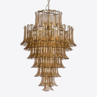 Amber Corolla Large Chandelier Elegant glass chandelier with layered, curved design, ideal for modern and sophisticated interiors. Maison Mermont.