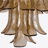 Amber Corolla Large Chandelier Elegant amber glass pendant light with flowing petal-shaped design, enhancing any modern decor. Maison Mermont.