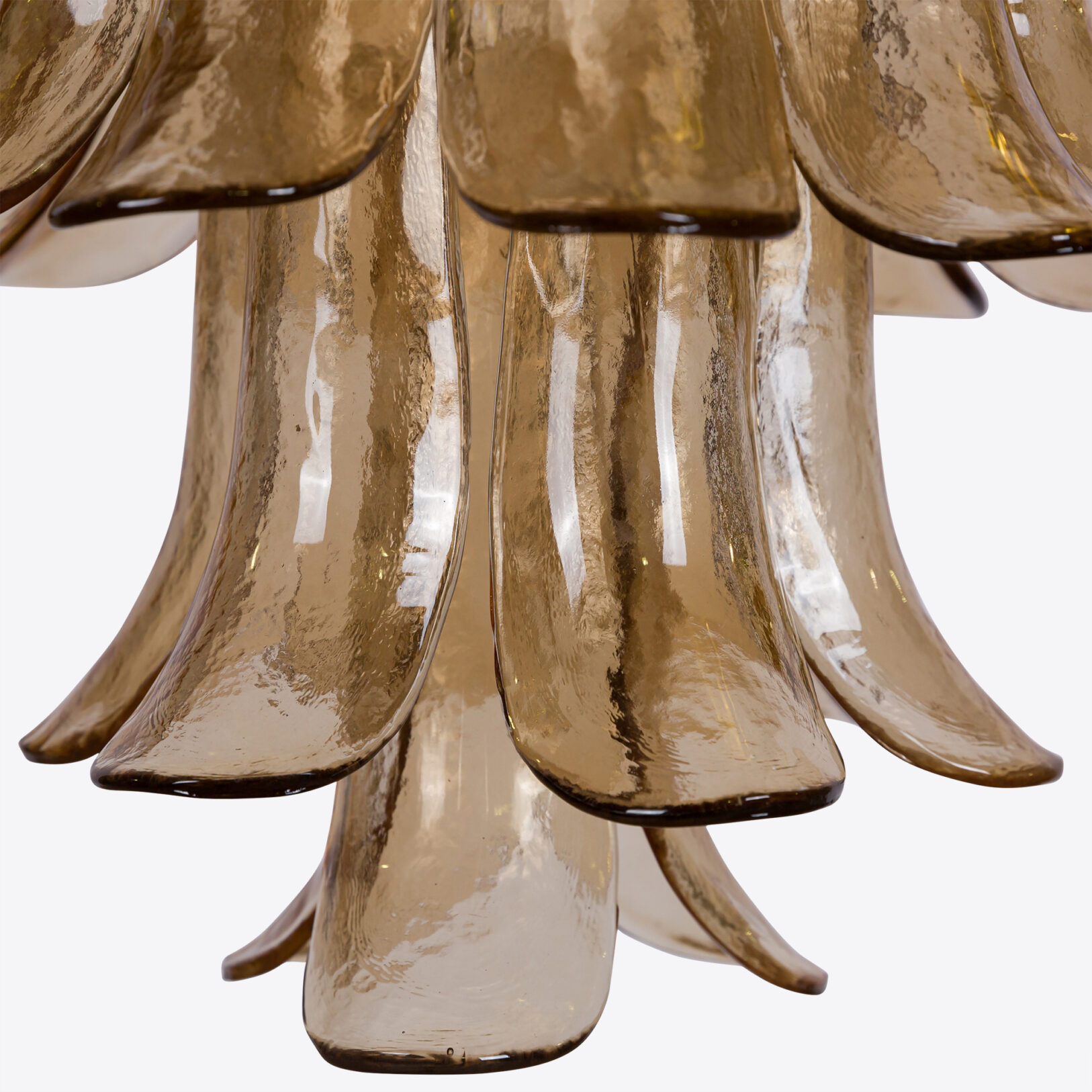 Amber Corolla Large Chandelier Elegant amber glass pendant light with flowing petal-shaped design, enhancing any modern decor. Maison Mermont.