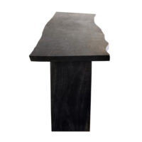 Organic modern console table with minimalist design and natural live edges in dark wood finish. Maison Mermont.