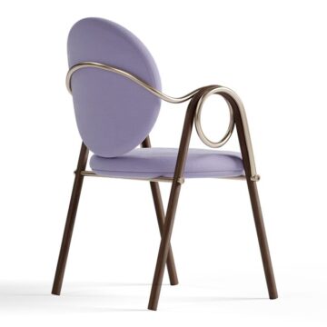 Stylish liana upholstered chair with a sleek metal frame, perfect for modern interiors. Maison Mermont.
