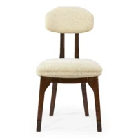 maison-mermont-silhouette-dining-chair-darli-01-translucent-dark-brown-01 Elegant beige upholstered chair with a wooden frame, perfect for modern dining spaces. Maison Mermont.