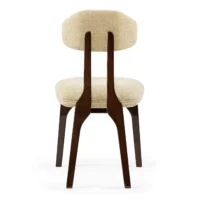 maison-mermont-silhouette-dining-chair-darli-01-translucent-dark-brown-05 Elegant wooden chair with a beige upholstered seat and rounded backrest, perfect for modern interiors. Maison Mermont.