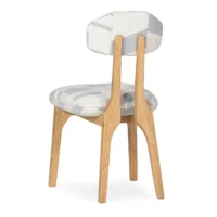 maison-mermont-silhouette-dining-chair-rif-01-oak-02 Stylish wooden chair with a patterned upholstered seat and backrest, perfect for modern interiors. Maison Mermont.
