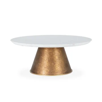 Elegant white marble top coffee table with a textured brass base, perfect for modern living spaces. Maison Mermont.